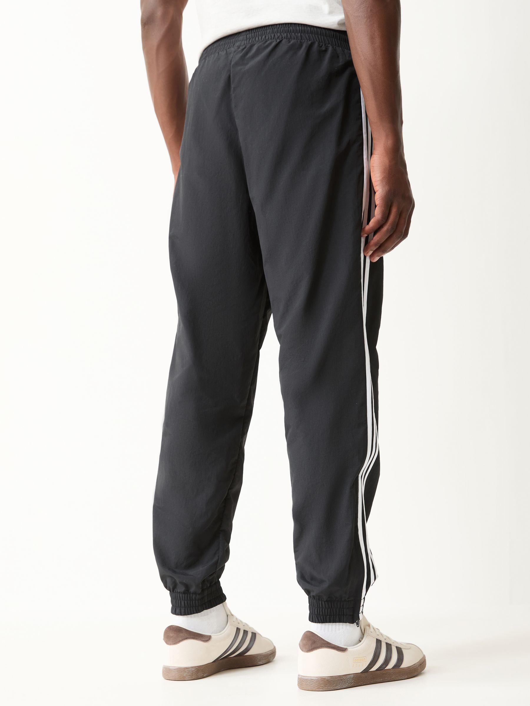 Comprar Preto - Calça de treino Adidas Original Firebird Woven