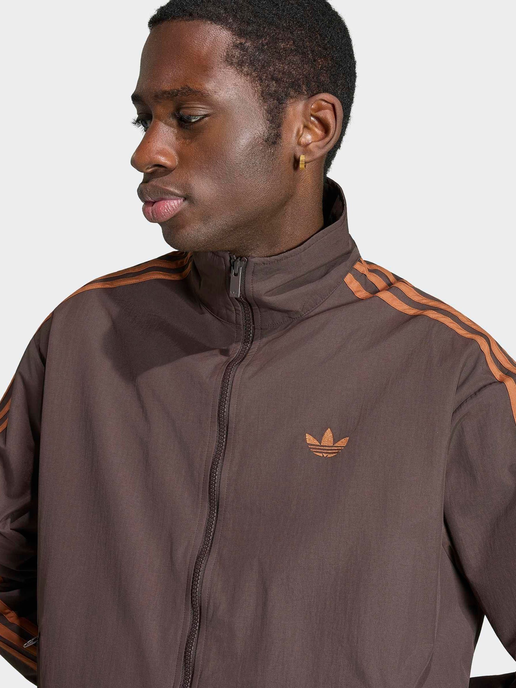 Buy adidas Originals Brown Firebird Woven Track Jacket from the