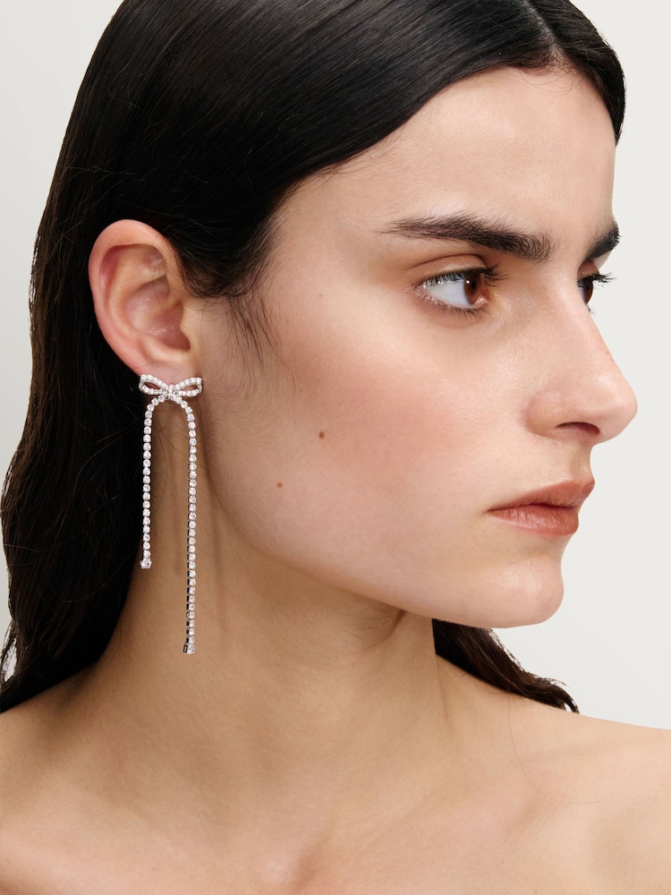 Self-Portrait Silver Tone Crystal Bow Dangle Earrings - Image 2 of 4 Self-Portrait Silver Tone Crystal Bow Dangle Earrings - Image 2 of 4