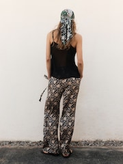 BHOEM Satin Floral Printed Fluid Wide Leg Black/Ecru Trousers - Image 3 of 4