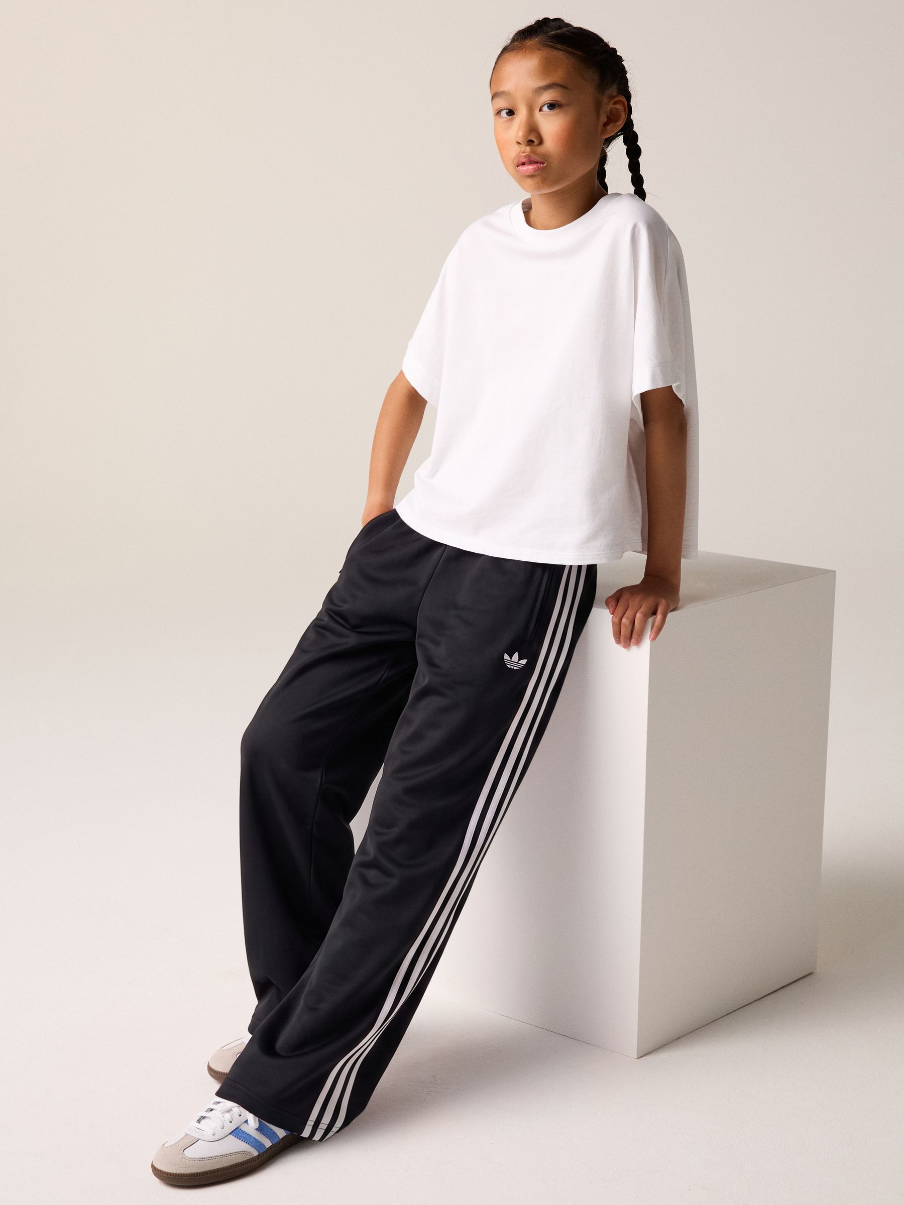 Buy adidas Originals Black Firebird Loose Trousers from the Next