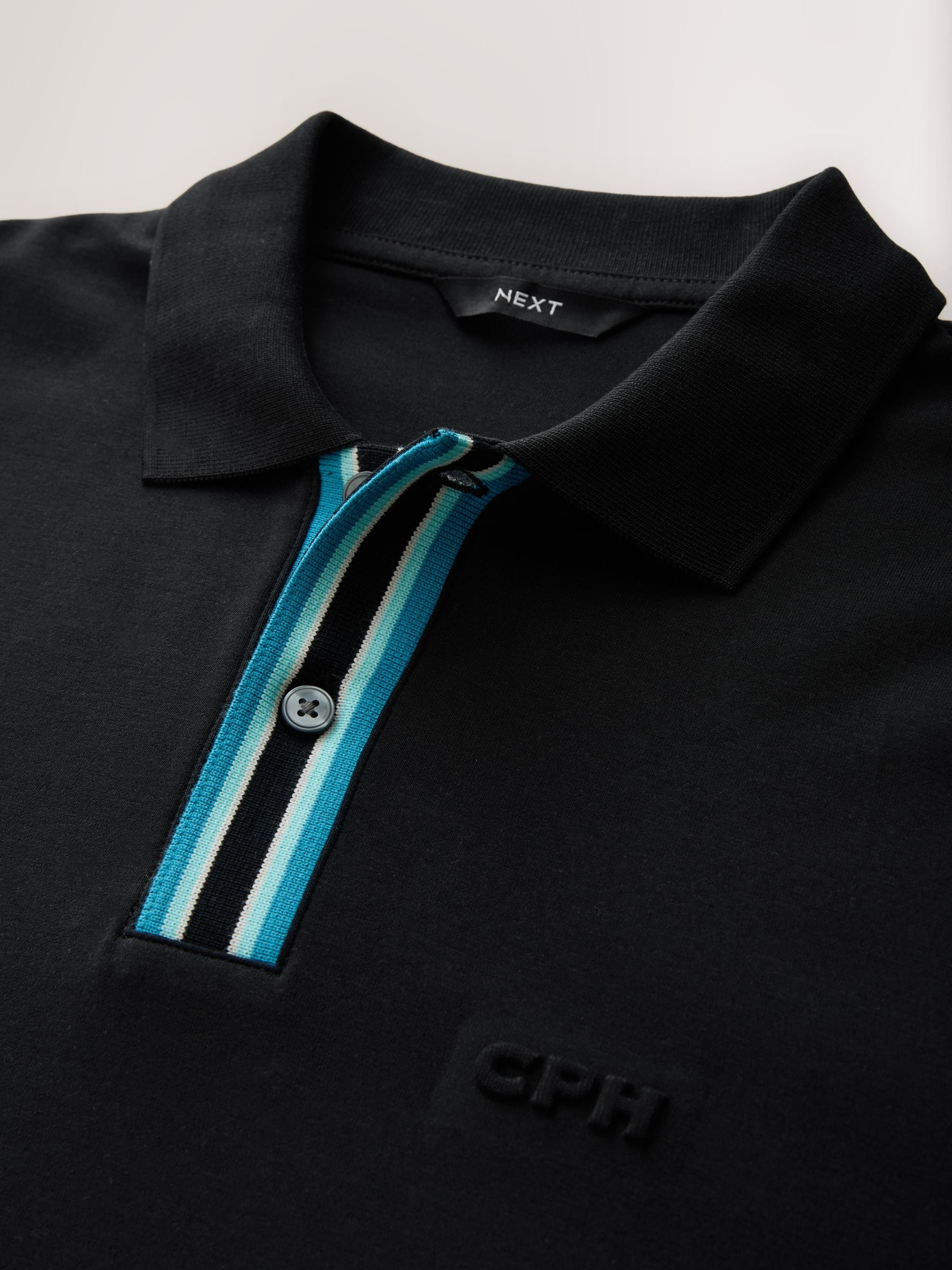 Buy Black Embossed Motionflex Tipped Polo Shirt from Next USA