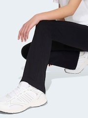 Negro - Leggings acampanados adidas Essentials - Imagen 4 de 6