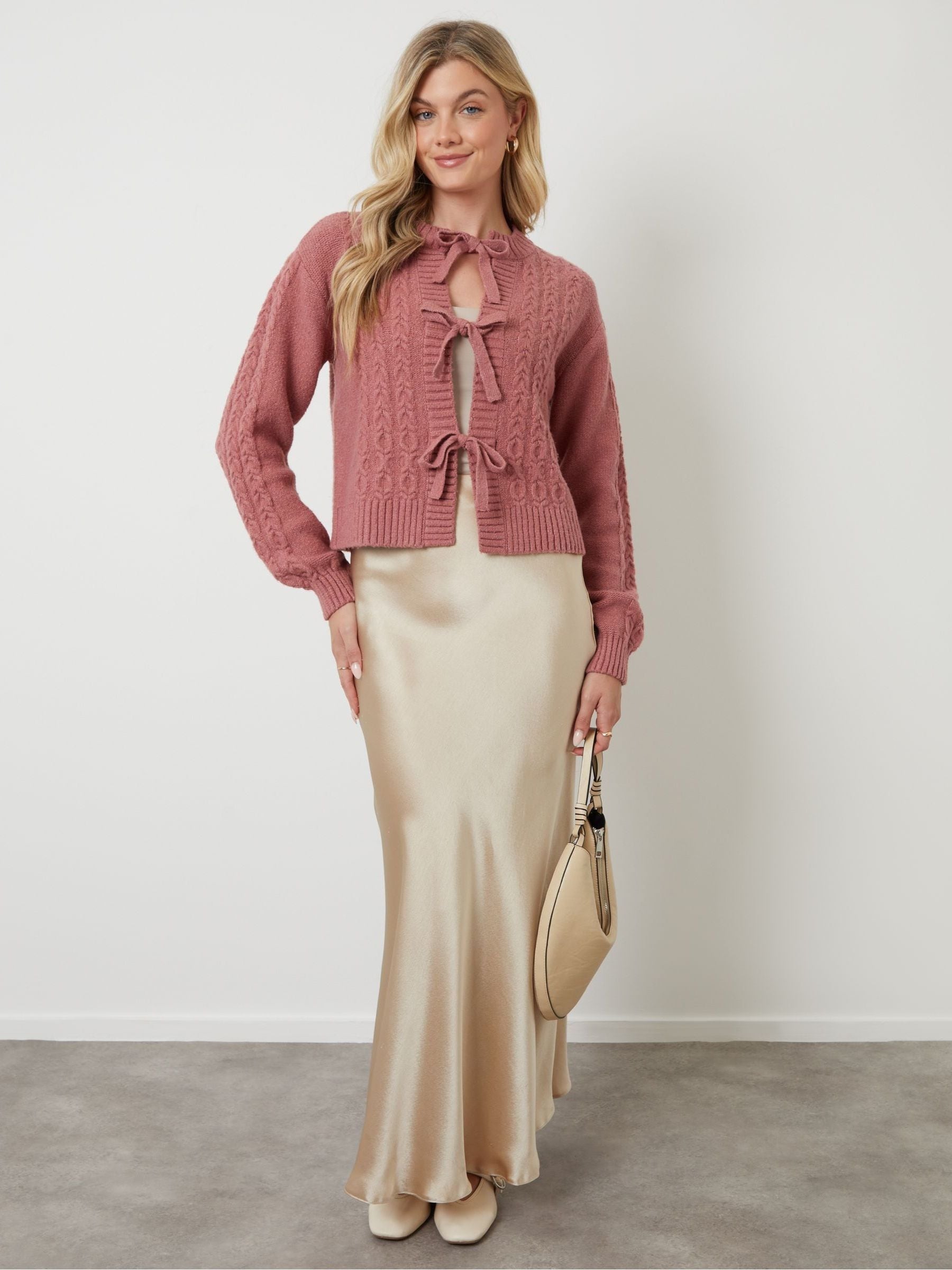 Next：日本 ピンク - Another Sunday ケーブルニット タイフロント