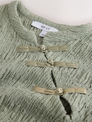 Sage Green Short Sleeved Textured Knot Fastening Top - Image 8 of 9