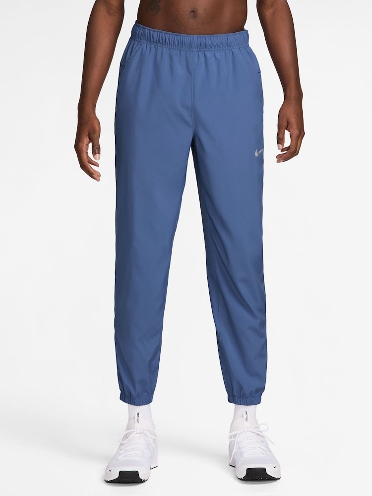 Indigo Storm Blue - بنطلون رياضي للتدريب بقصّة مائلة وتقنية Dri-FIT من Nike - صورة 1 من 4