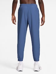 Indigo Storm Blue - بنطلون رياضي للتدريب بقصّة مائلة وتقنية Dri-FIT من Nike - صورة 2 من 4