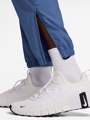 Indigo Storm Blue - بنطلون رياضي للتدريب بقصّة مائلة وتقنية Dri-FIT من Nike - صورة 3 من 4