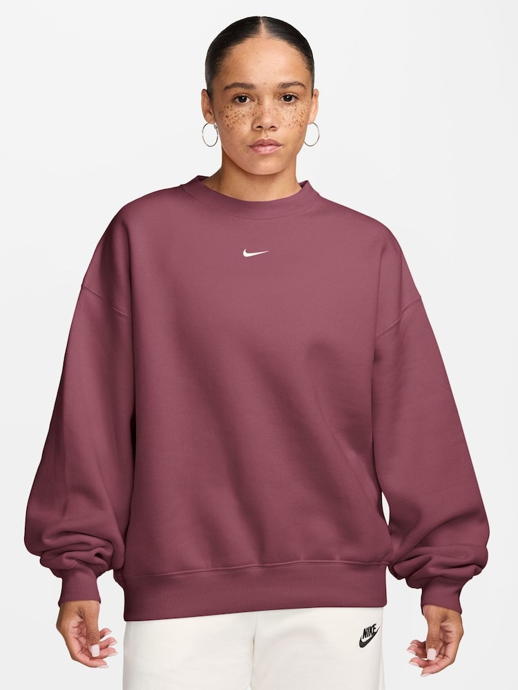 Nike Pink Smoke Studio Fleece Oversized Crew Neck Sweat Top - Image 1 of 3 Nike Pink Smoke Studio Fleece Oversized Crew Neck Sweat Top - Image 1 of 3