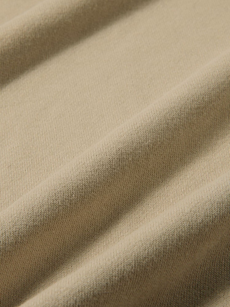 Estilo paracaidista beis natural - Camiseta corta extragrande de felpa Nike Studio - Imagen 7 de 7