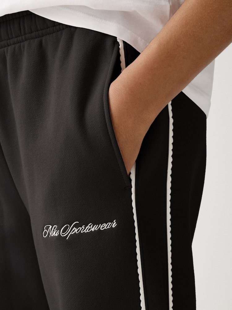 Černý - Flísové Jogger kalhoty Nike Studio se středně vysokým pasem a Široké nohavice - Obrázek 4 z 4
