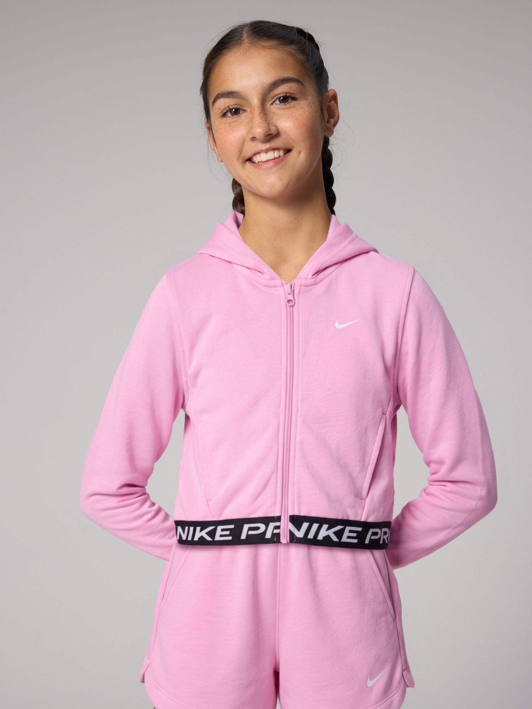 Next：日本 ピンクライズ - Nike Pro Dri-FIT クロップド フリース