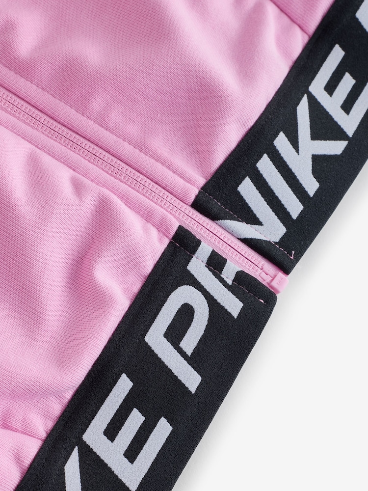 Różowy - Bluza z kapturem z polaru o skróconym kroju Nike Pro Dri-FIT - Obraz 7 z 7 Różowy - Bluza z kapturem z polaru o skróconym kroju Nike Pro Dri-FIT - Obraz 7 z 7