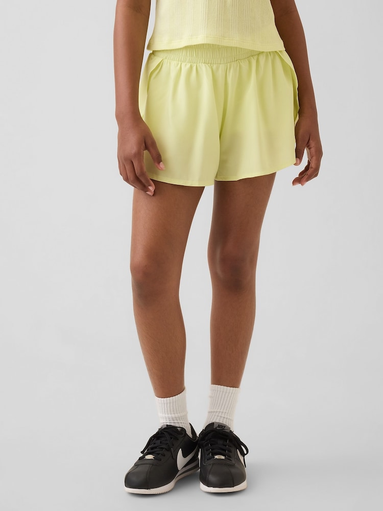Gap Yellow Quick-Dry Butterfly-Hem Run Shorts (4-13yrs) - Image 1 of 5 Gap Yellow Quick-Dry Butterfly-Hem Run Shorts (4-13yrs) - Image 1 of 5