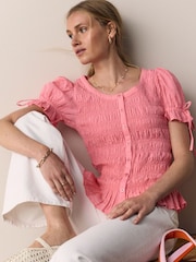 Pink Smocked Peplum Short Sleeve Top - Image 1 of 4