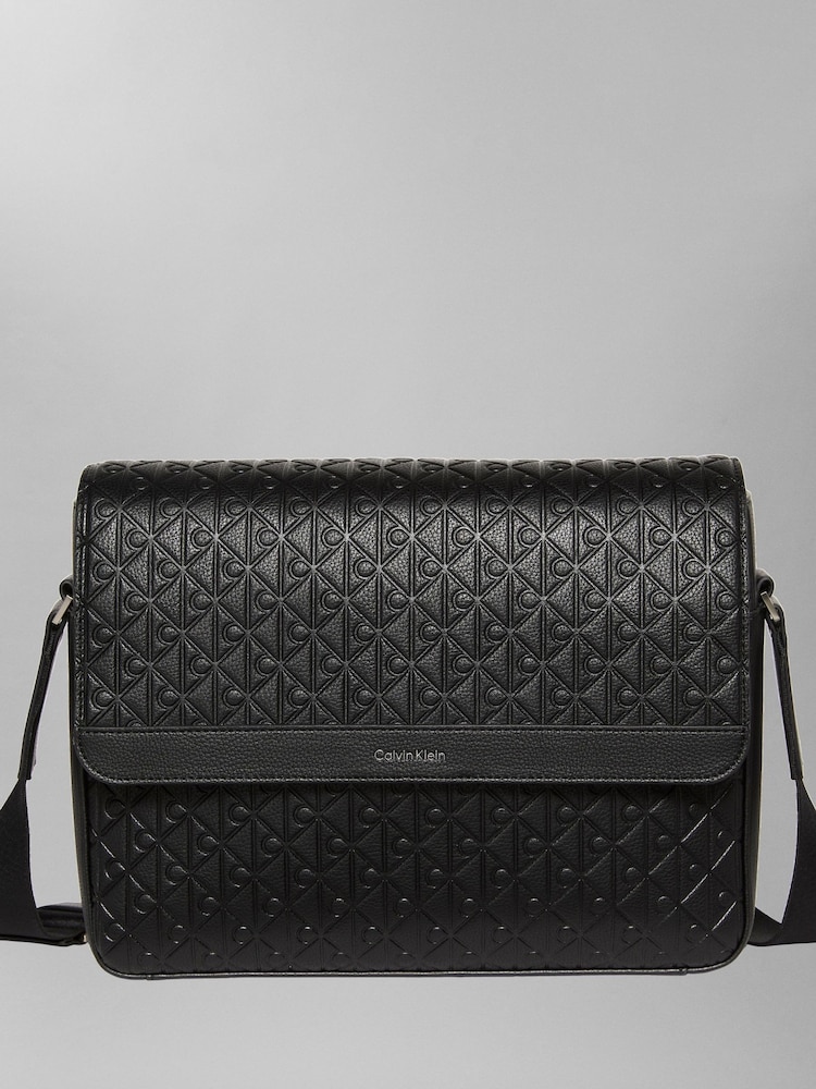 Calvin Klein Black Embossed Emblem Logo Flap Messenger Bag - Image 1 of 1