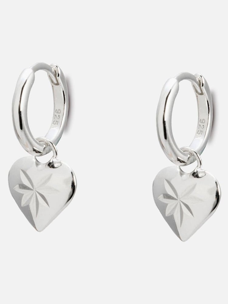 Oliver Bonas Sterling Silver Cora Engraved Heart Charm Hoop Drop Earrings - Image 1 of 5 Oliver Bonas Sterling Silver Cora Engraved Heart Charm Hoop Drop Earrings - Image 1 of 5