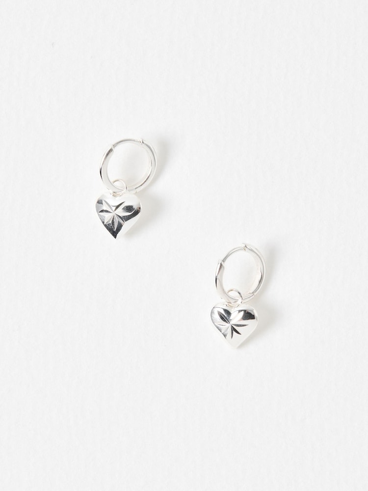 Oliver Bonas Sterling Silver Cora Engraved Heart Charm Hoop Drop Earrings - Image 2 of 5 Oliver Bonas Sterling Silver Cora Engraved Heart Charm Hoop Drop Earrings - Image 2 of 5