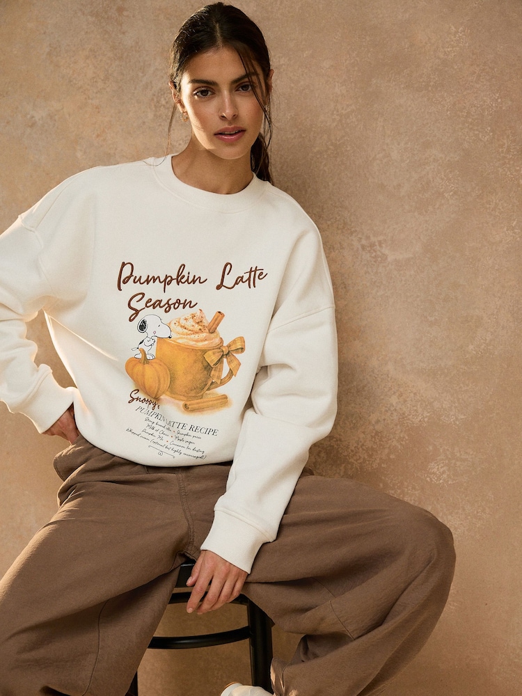 Ecru Pumpkin Latte Snoopy Licence Sweatshirt - Image 1 of 7 Ecru Pumpkin Latte Snoopy Licence Sweatshirt - Image 1 of 7