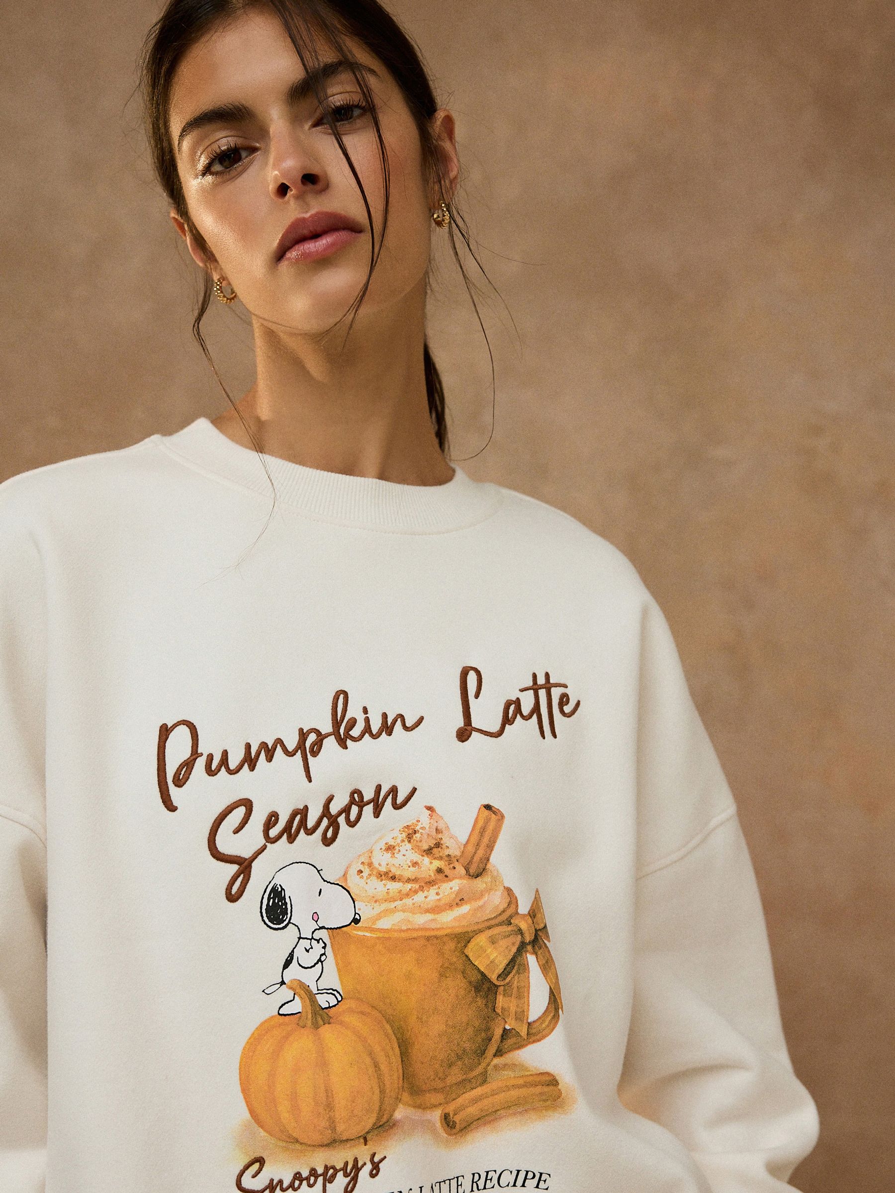 Buy Ecru Pumpkin Latte Snoopy Licence Sweatshirt from Next USA