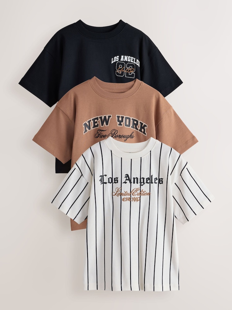 Brown/Cream/Black Relaxed Fit Graphic Print Short Sleeve T-Shirts 3 Pack (3-16yrs) - Image 1 of 7 Brown/Cream/Black Relaxed Fit Graphic Print Short Sleeve T-Shirts 3 Pack (3-16yrs) - Image 1 of 7