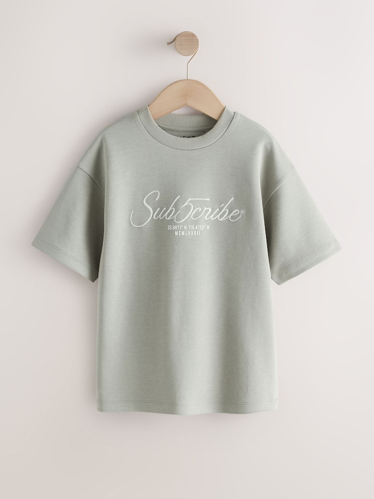 Mineral Green Graphic Heavyweight Short Sleeve T-Shirt (3-16yrs) - Image 1 of 4 Mineral Green Graphic Heavyweight Short Sleeve T-Shirt (3-16yrs) - Image 1 of 4