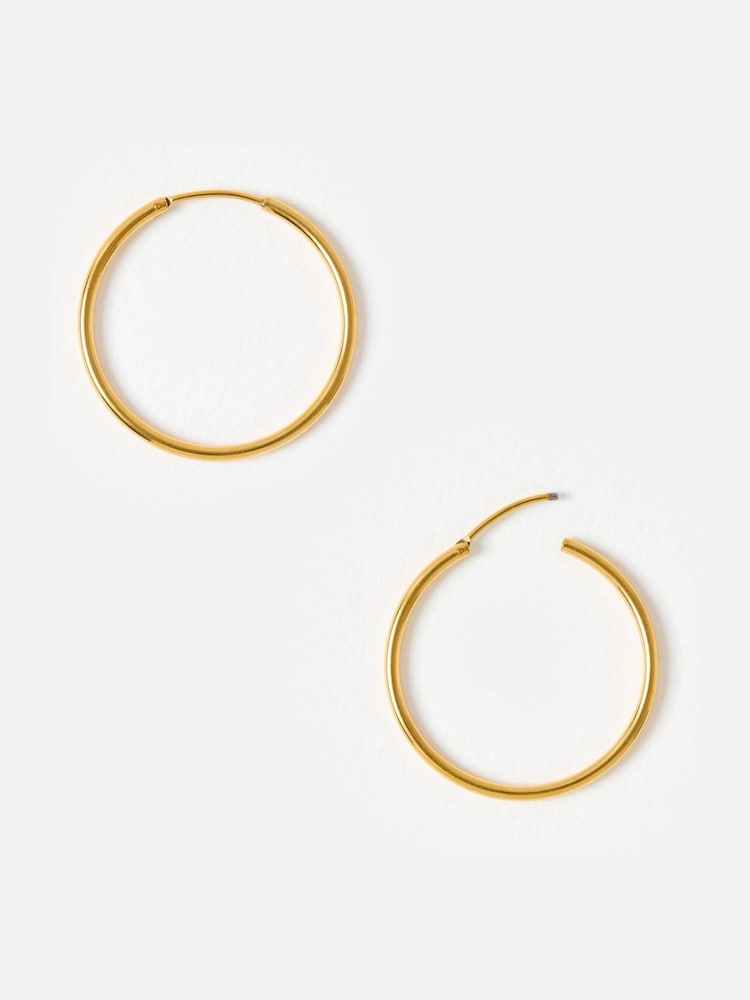 Oliver Bonas Gold Tone Janis Shiny Stainless Steel Waterproof Small Hoop Earrings - Image 2 of 5