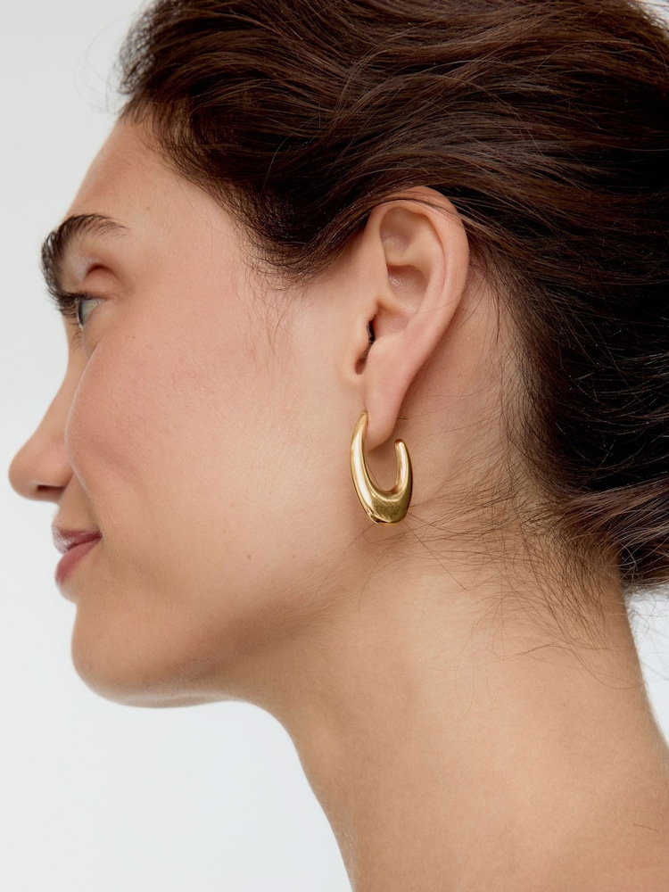 Oliver Bonas Gold Tone Simone Stainless Steel Waterproof Long Hoop Earrings - Image 6 of 6 Oliver Bonas Gold Tone Simone Stainless Steel Waterproof Long Hoop Earrings - Image 6 of 6