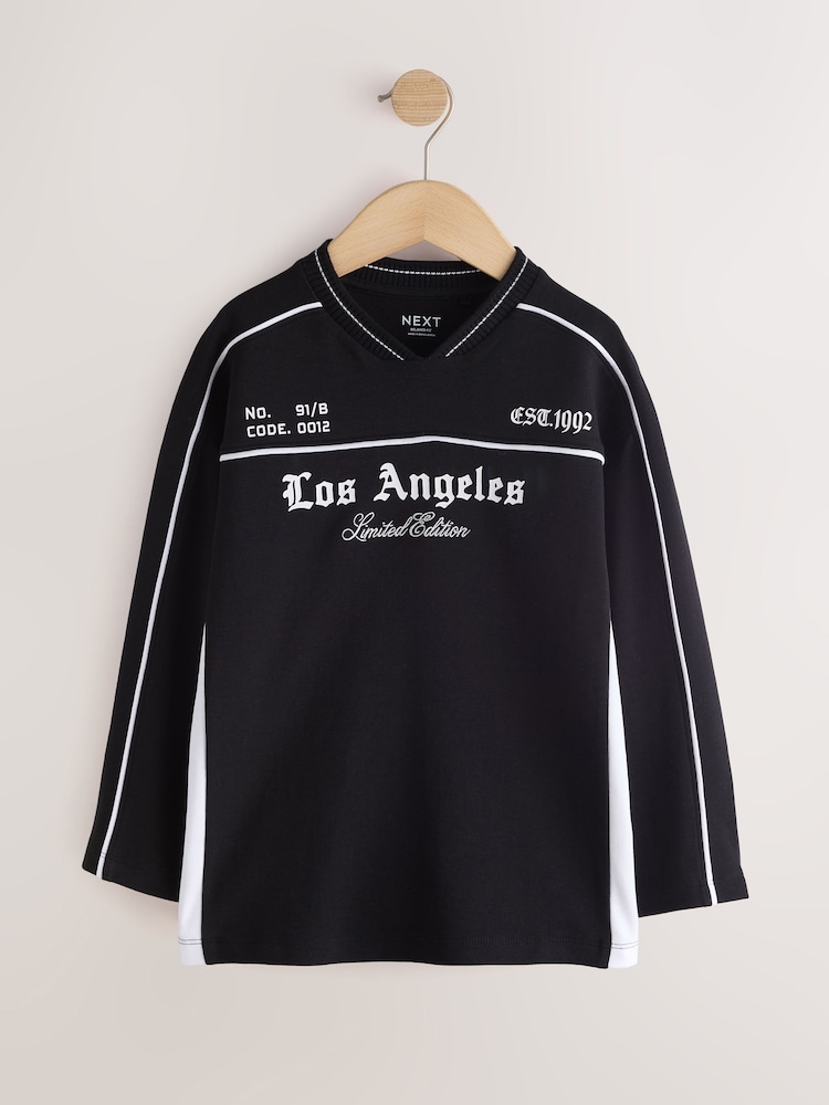 Black/White Varsity Long Sleeve Heavyweight Varsity T-Shirt (3-16yrs) - Image 1 of 4 Black/White Varsity Long Sleeve Heavyweight Varsity T-Shirt (3-16yrs) - Image 1 of 4
