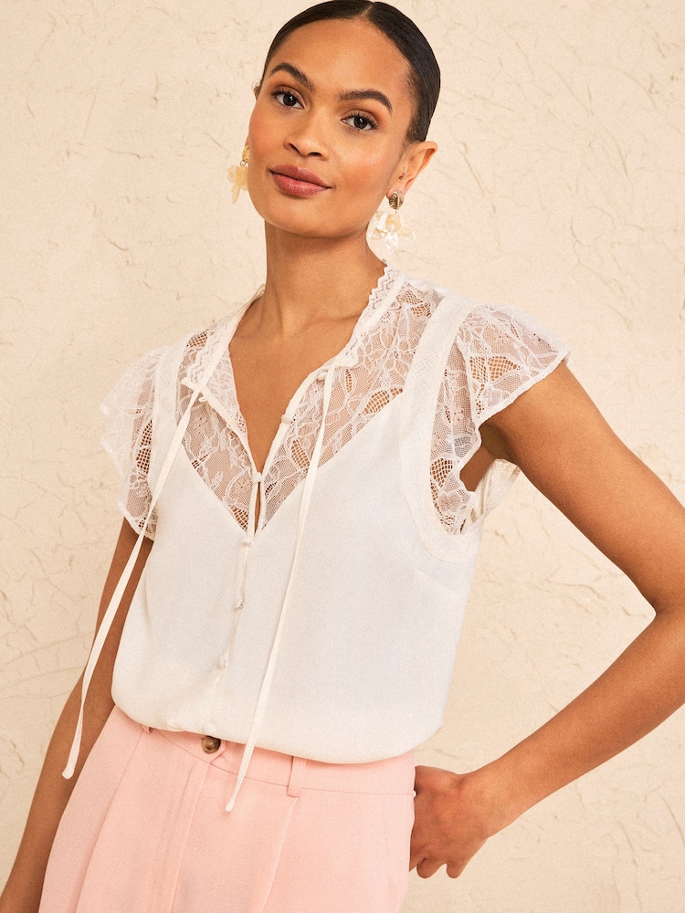 Love & Roses Ivory Petite Boudoir Lace Notch Neck Flutter Sleeve Blouse - Image 1 of 4