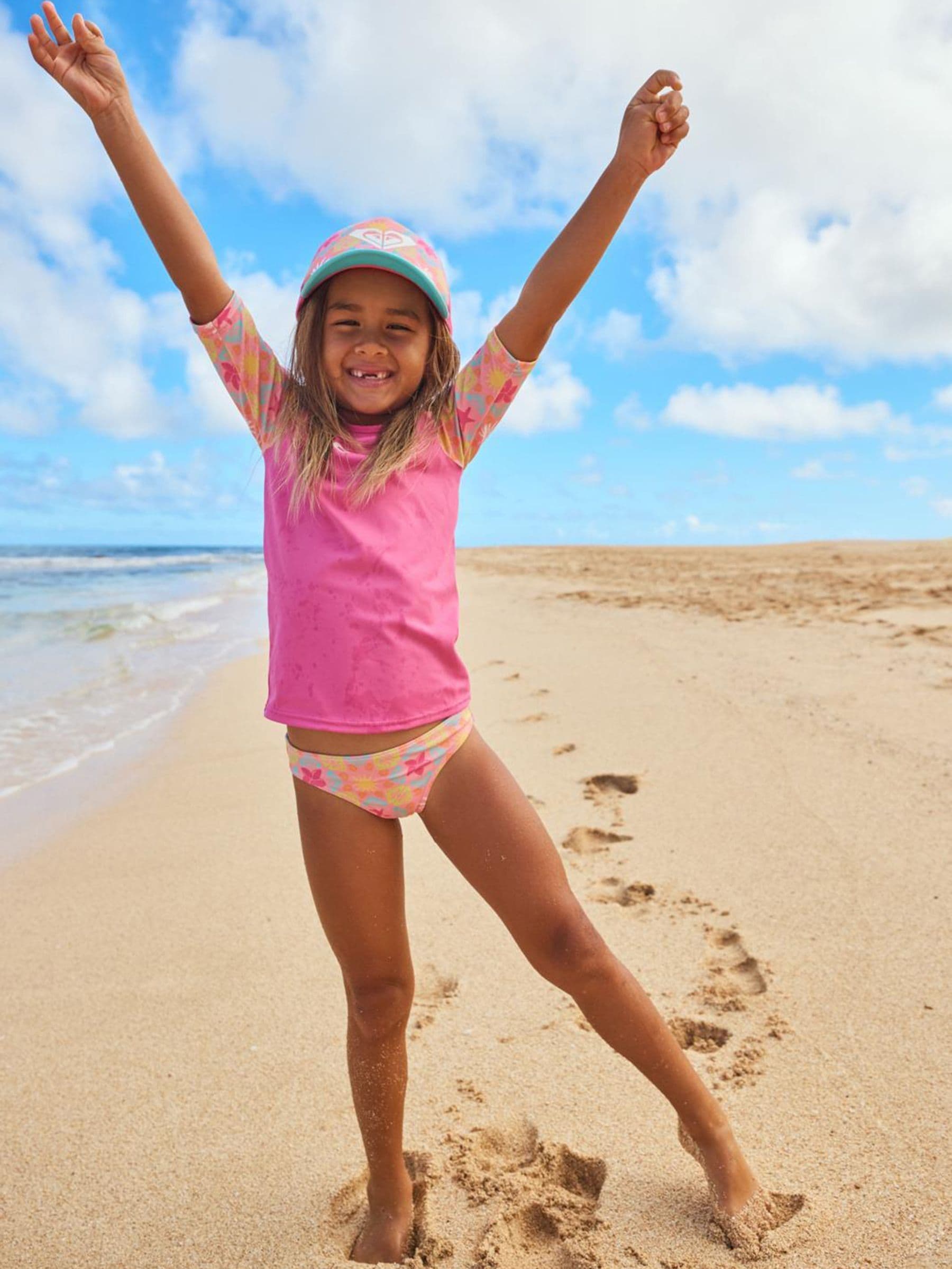 Buy Roxy Pink Check Logo Short Sleeve Rash Vest Swim Set from Next USA