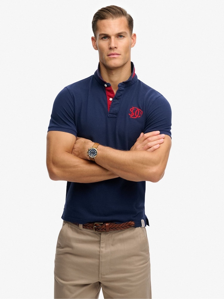 Superdry Blue Pique Monogram Polo Shirt - Image 1 of 6 Superdry Blue Pique Monogram Polo Shirt - Image 1 of 6