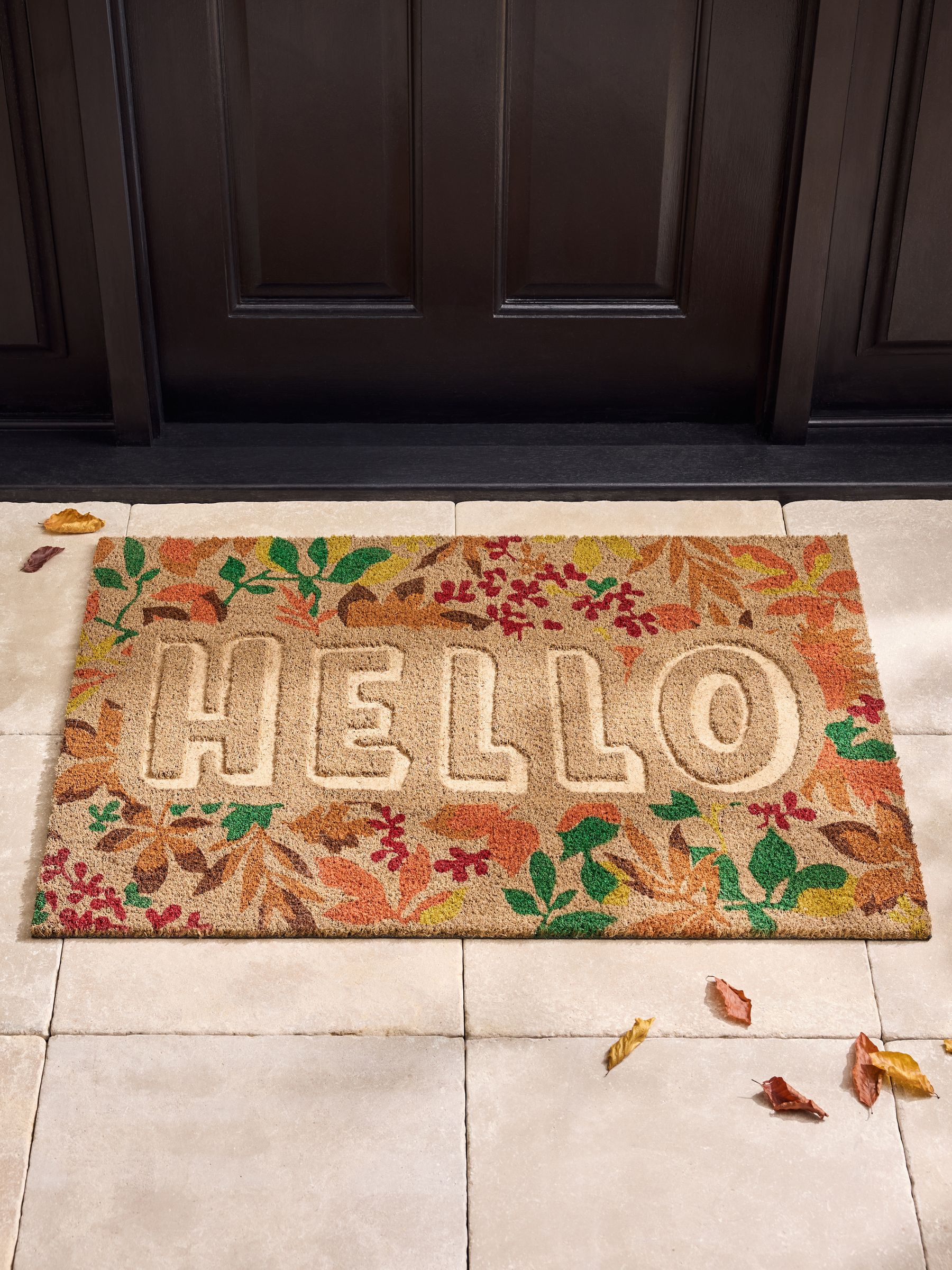 Multi Floral Embossed Hello Coir Doormat