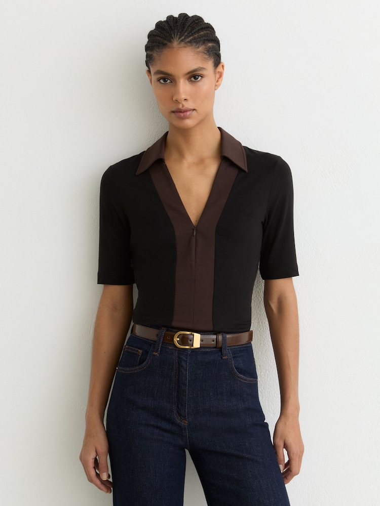Reiss Black/Chocolate Brown Denny Jersey Colour-Block Half-Zip Polo Top - Image 1 of 6 Reiss Black/Chocolate Brown Denny Jersey Colour-Block Half-Zip Polo Top - Image 1 of 6
