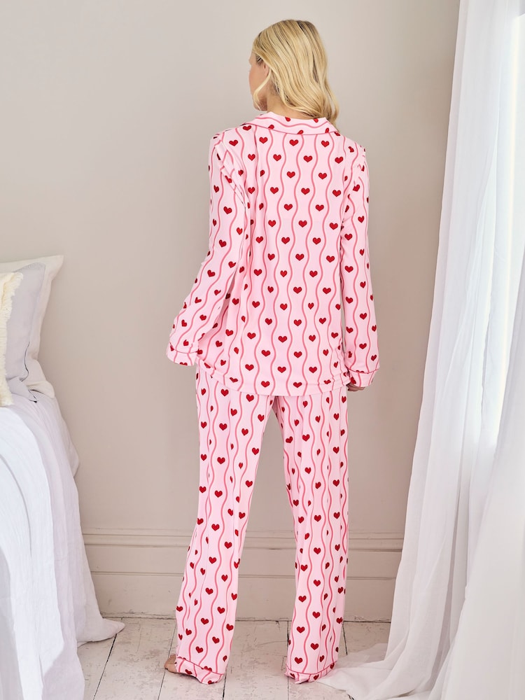 Buy Chelsea Peers Pink Maternity Wavy Stripe Heart Print Long Pyjamas ...