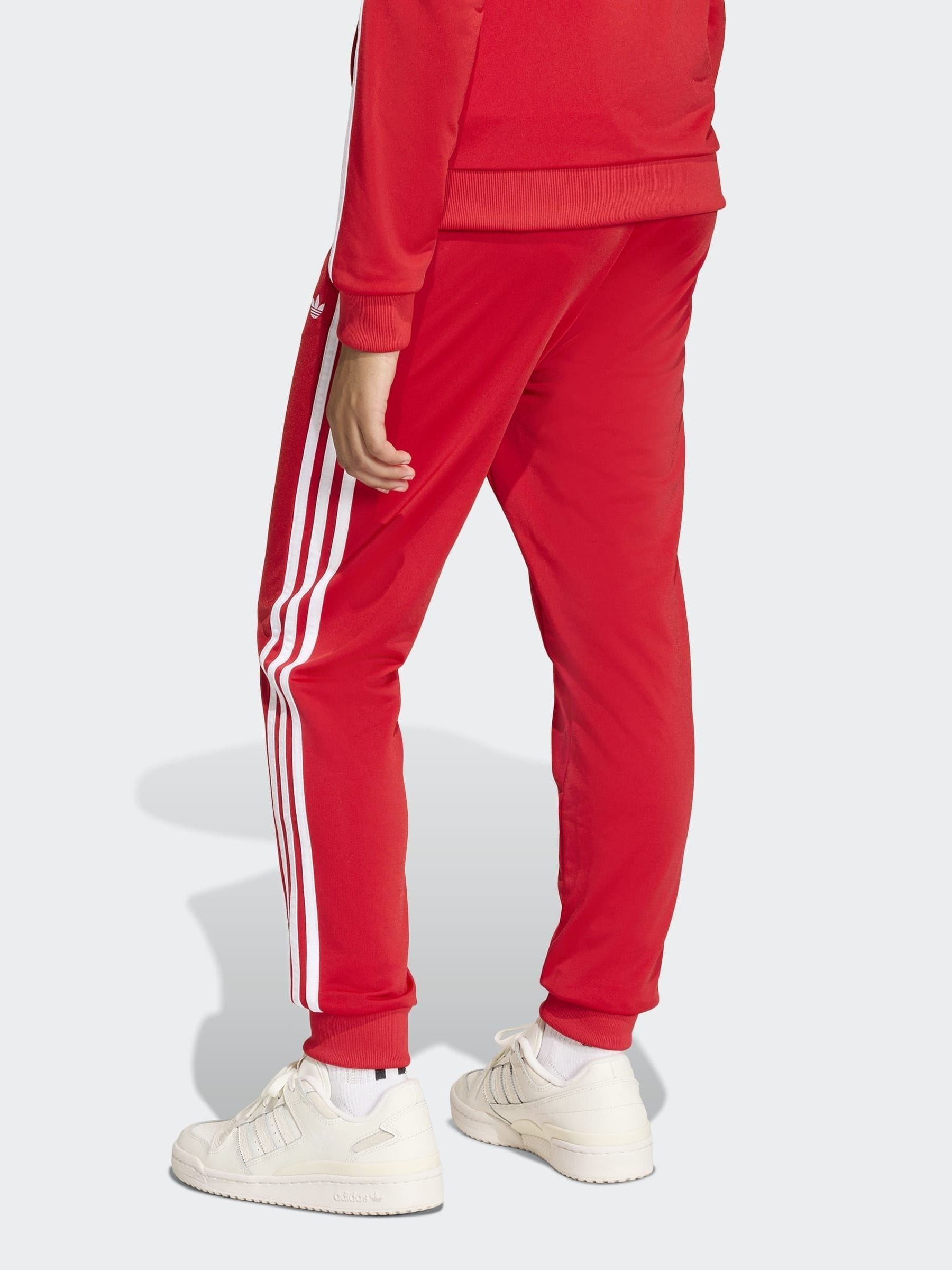 nike tracksuit bottoms red