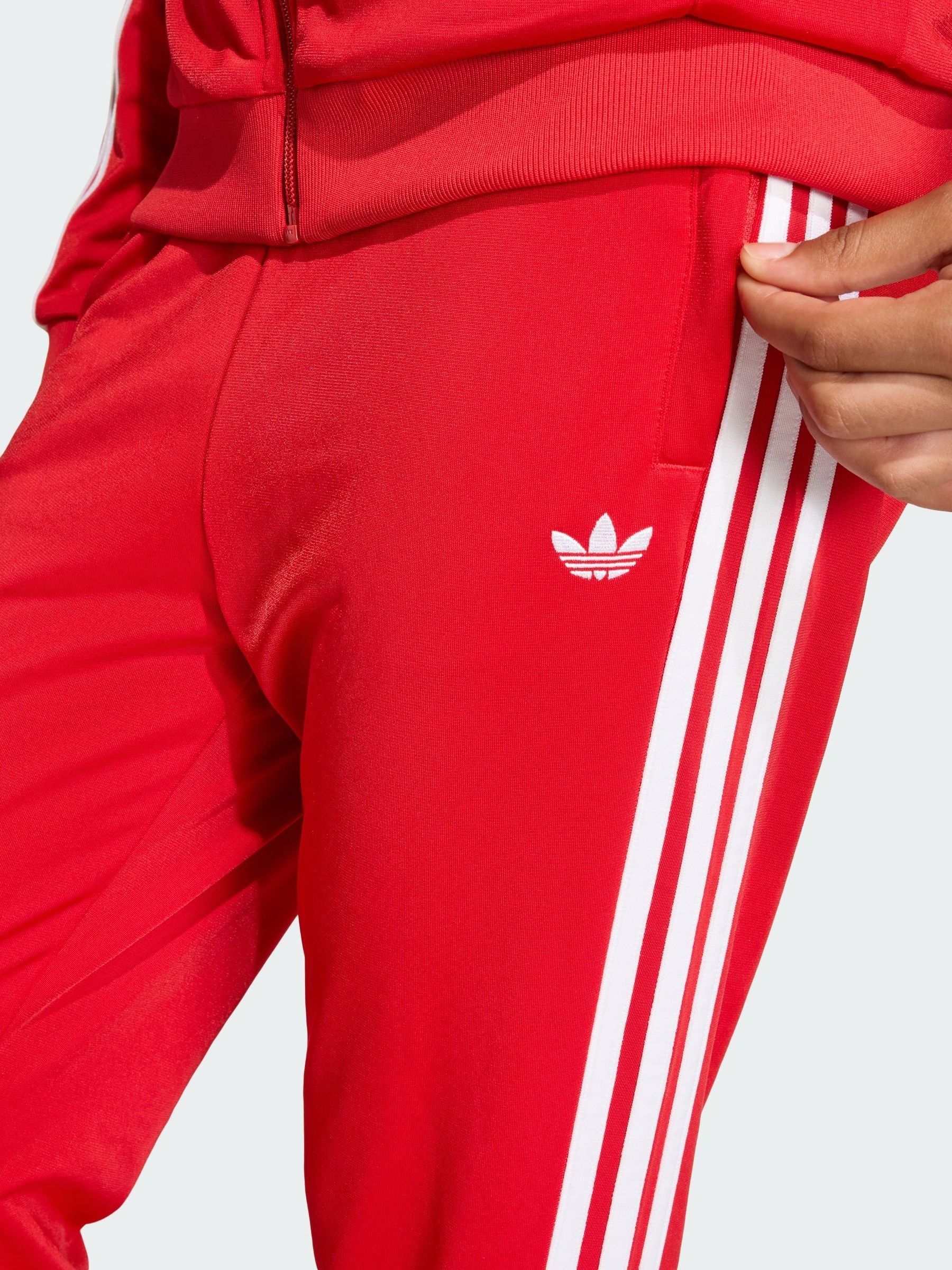 Buy adidas Originals Red SST Tracksuit Bottoms from Next USA