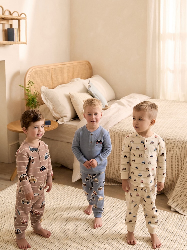 Ecru/Blue/Tan Transport Snuggle Pyjamas 3 Pack (9mths-8yrs) - Image 1 of 12 Ecru/Blue/Tan Transport Snuggle Pyjamas 3 Pack (9mths-8yrs) - Image 1 of 12