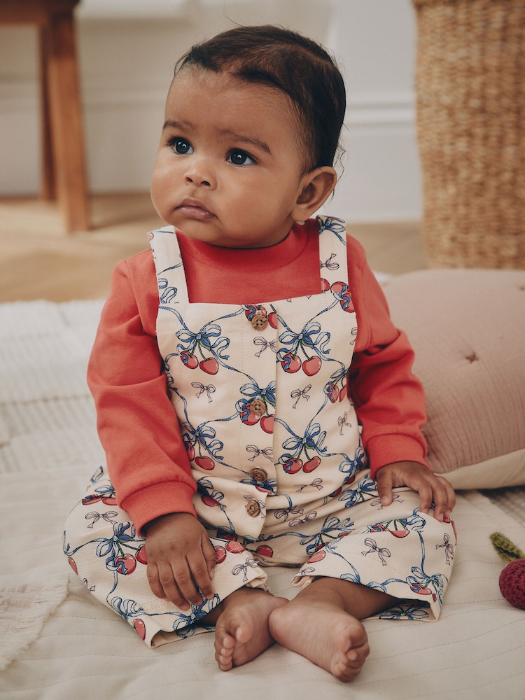 Ecru Cherry Baby Long Sleeve Bodysuit And Woven Dungaree 2 Piece Set (0mths-2yrs) - Image 1 of 1 Ecru Cherry Baby Long Sleeve Bodysuit And Woven Dungaree 2 Piece Set (0mths-2yrs) - Image 1 of 1