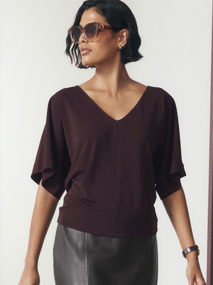 Wine Short Sleeved V-Neck Top - Image 1 of 8 Wine Short Sleeved V-Neck Top - Image 1 of 8