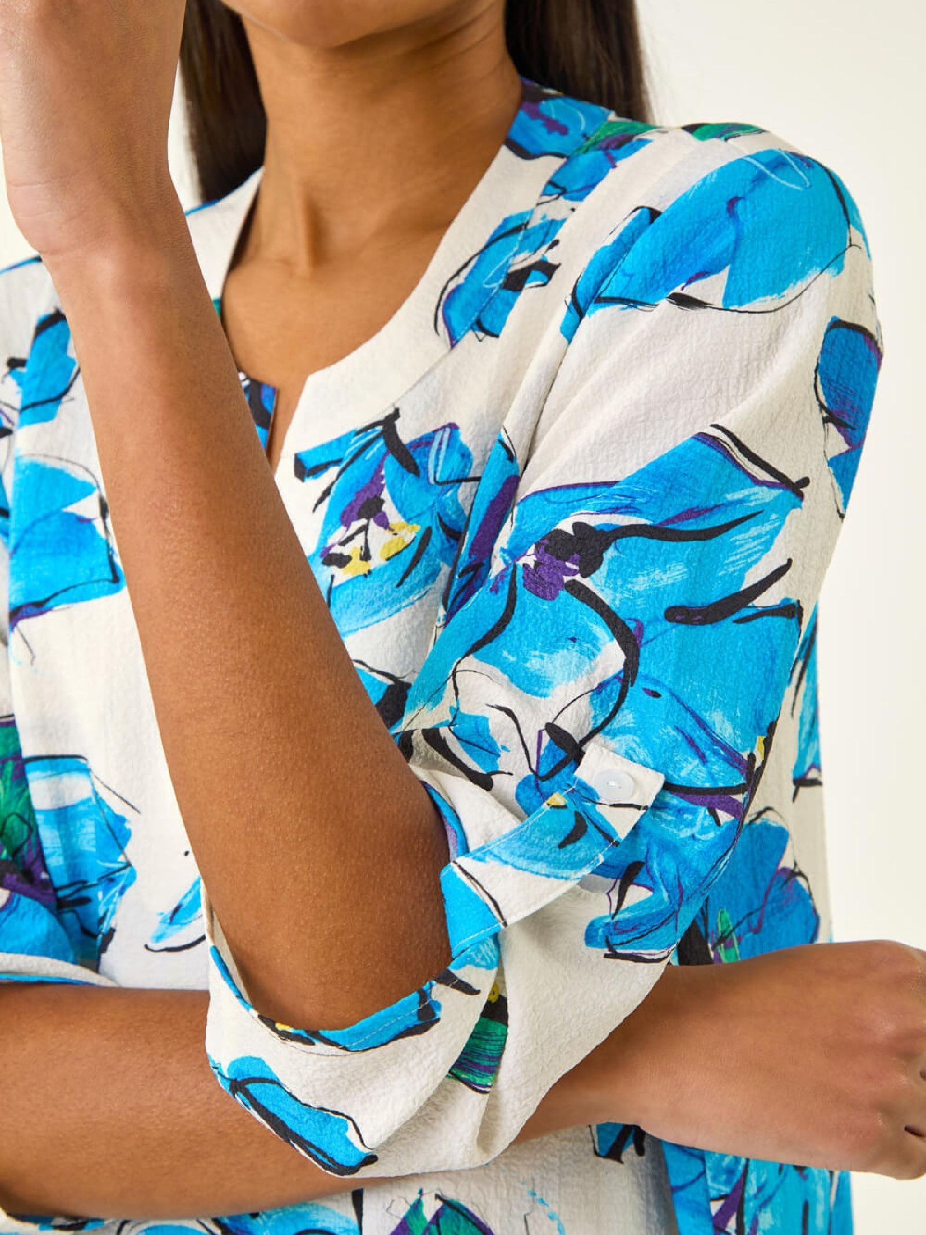 Buy Roman Blue Floral Wrap Hem Stretch Tunic Top from Next USA