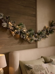 Green/White Artificial Light Up Snowy Christmas Garland - Image 1 of 3