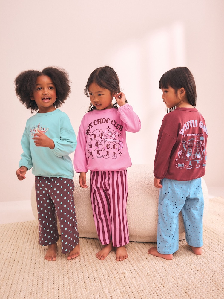 Pink/ Brown Graphic Top Wide Leg Pyjamas 3 Pack (9mths-10yrs) - Image 1 of 12 Pink/ Brown Graphic Top Wide Leg Pyjamas 3 Pack (9mths-10yrs) - Image 1 of 12