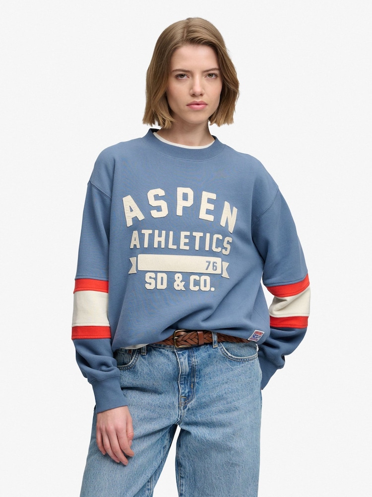 Superdry Blue Preppy Ski Sweatshirt - Image 1 of 7 Superdry Blue Preppy Ski Sweatshirt - Image 1 of 7