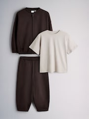 The Set 3 Piece Jersey Zip Through Bomber Short Sleeve Oversized T-Shirt and Barrel Jogger Set Chocolate Brown/Cream - Image 1 of 6