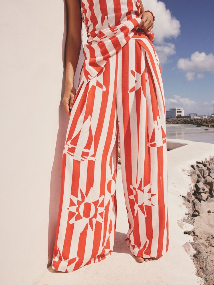 Red/White Stripe Sun Print Pleat Front Wide Leg Trousers - Image 1 of 7 Red/White Stripe Sun Print Pleat Front Wide Leg Trousers - Image 1 of 7