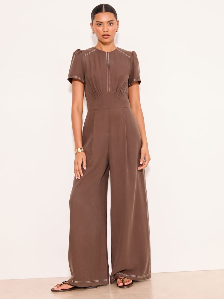 Lipsy Brown Contrast Stitch Underbust Belted Short Sleeve Jumpsuit - Image 1 of 4 Lipsy Brown Contrast Stitch Underbust Belted Short Sleeve Jumpsuit - Image 1 of 4