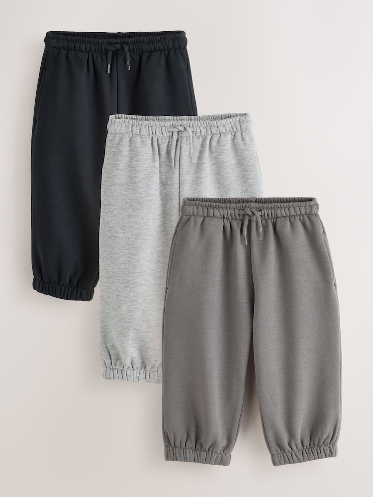 Grey/Black Wide Cuffed Joggers 3 Pack (3mths-7yrs) - Image 1 of 7 Grey/Black Wide Cuffed Joggers 3 Pack (3mths-7yrs) - Image 1 of 7