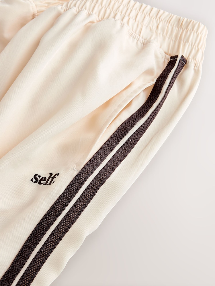 self. Ecru Wide Leg Viscose Blend Track Trousers With Side Stripe - Image 9 of 9 self. Ecru Wide Leg Viscose Blend Track Trousers With Side Stripe - Image 9 of 9