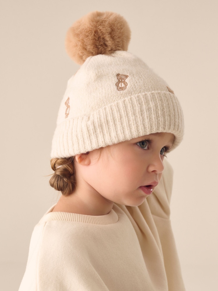 Ecru Bear Pom Beanie Hat (3mths-16yrs) - Image 1 of 6 Ecru Bear Pom Beanie Hat (3mths-16yrs) - Image 1 of 6